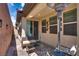 Cozy covered patio, perfect for outdoor entertaining or relaxing with stylish patio furniture at 7559 Chimney Point Ct, Las Vegas, NV 89166