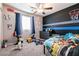 Vibrant bedroom featuring a basketball hoop and sports decor at 7721 Sheliak St, North Las Vegas, NV 89084