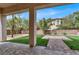 Inviting backyard with artificial turf, paver patio, and a covered patio at 7878 Brianna Cheerful Ave, Las Vegas, NV 89178