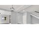 Spacious living room with views and staircase showcasing an open layout and ample natural light at 7878 Brianna Cheerful Ave, Las Vegas, NV 89178