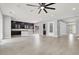 Large open-concept design featuring a seamless transition to the kitchen area with abundant space at 7878 Brianna Cheerful Ave, Las Vegas, NV 89178