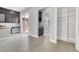 Open floor plan with built-in bar and kitchen views, enhancing the living space's flow at 7878 Brianna Cheerful Ave, Las Vegas, NV 89178