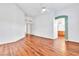 A nice bedroom with wood floors, neutral paint, and ensuite bathroom access at 7990 Timber Horn Ct, Las Vegas, NV 89147