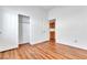 Bedroom featuring wood floors, closet, and neutral paint at 7990 Timber Horn Ct, Las Vegas, NV 89147