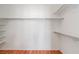 Spacious, well-organized walk-in closet with shelving and ample hanging space at 7990 Timber Horn Ct, Las Vegas, NV 89147