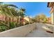 Balcony view of tropical trees and tile rooftops at 8051 Castle Pines Ave, Las Vegas, NV 89113
