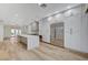 Spacious kitchen boasts new stainless steel appliances, custom cabinets, and a large center island at 8051 Castle Pines Ave, Las Vegas, NV 89113