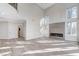Bright living room featuring a modern fireplace and hardwood floors at 8051 Castle Pines Ave, Las Vegas, NV 89113