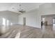 The room boasts natural light, a modern ceiling fan, and an open, airy layout at 8051 Castle Pines Ave, Las Vegas, NV 89113