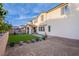 Backyard features a low-maintenance landscape, covered patio and view of the house at 8171 California Pine St, Las Vegas, NV 89166