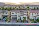 Stunning two-story home with a well-manicured front yard, three-car garage, and mountain views at 8171 California Pine St, Las Vegas, NV 89166