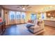 Bright living room with lots of natural light, and a view of the kitchen and the backyard at 8171 California Pine St, Las Vegas, NV 89166