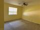 Bedroom featuring a ceiling fan and a window at 881 E Calvada Blvd, Pahrump, NV 89048