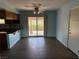 An eat-in kitchen area with sliding glass door to the backyard at 881 E Calvada Blvd, Pahrump, NV 89048