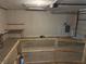This garage features ample space and built-in shelving perfect for storage at 881 E Calvada Blvd, Pahrump, NV 89048