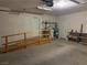 The garage features a ramp, water tanks, and shelving for organized storage at 881 E Calvada Blvd, Pahrump, NV 89048