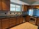 Stainless steel appliances, wood cabinets and a window overlooking the yard make this a beautiful kitchen at 881 E Calvada Blvd, Pahrump, NV 89048