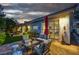 Relaxing backyard patio with comfortable seating, privacy landscaping and serene lighting at 8969 Rivers Edge Dr, Las Vegas, NV 89117