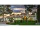 Charming single-story home featuring a tile roof, well-manicured landscaping, and an attached two-car garage at 8969 Rivers Edge Dr, Las Vegas, NV 89117