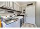 Functional laundry room with modern appliances, ample storage, and easy access to the exterior at 8969 Rivers Edge Dr, Las Vegas, NV 89117