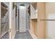 Spacious walk-in closet with custom shelving and drawers for optimal organization at 8969 Rivers Edge Dr, Las Vegas, NV 89117