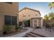 The exterior has a shed and fountain next to a brick patio with a walkway at 9012 Alpine Peaks Ave, Las Vegas, NV 89147