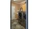 Well-equipped laundry room with modern washer and dryer at 9012 Alpine Peaks Ave, Las Vegas, NV 89147
