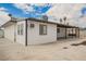 Spacious backyard with a covered patio area, perfect for outdoor seating and enjoying the serene surroundings at 902 Westminster Ave, Las Vegas, NV 89119