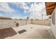 The backyard has concrete and gravel landscaping, fenced for privacy at 902 Westminster Ave, Las Vegas, NV 89119