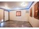 Comfortable bedroom features wood floors and a neutral wall paint at 902 Westminster Ave, Las Vegas, NV 89119