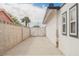 The side driveway offers ample space and secure gated access to the backyard at 902 Westminster Ave, Las Vegas, NV 89119