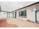 Single-story home with brick-paved patio and charming street number signage at 902 Westminster Ave, Las Vegas, NV 89119