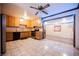 Bright eat in kitchen features stainless steel appliances and tile floors at 902 Westminster Ave, Las Vegas, NV 89119
