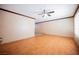 Open-concept living room with beautiful wood floors and ample natural light at 902 Westminster Ave, Las Vegas, NV 89119