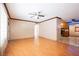 Spacious living room with hardwood floors and seamless flow into other rooms at 902 Westminster Ave, Las Vegas, NV 89119