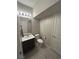 Bathroom with tile flooring, new vanity, and plenty of lighting at 95 Palm Park Ct, Las Vegas, NV 89183