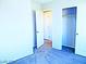 Bedroom with neutral carpet and natural light and a closet for functional organization at 95 Palm Park Ct, Las Vegas, NV 89183