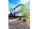 Charming two-story home with a well-maintained front yard, appealing landscaping, and inviting entrance at 95 Palm Park Ct, Las Vegas, NV 89183