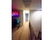 Upstairs hallway with carpet and a view down the hall and the top of the stairs at 95 Palm Park Ct, Las Vegas, NV 89183