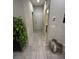 Hallway with neutral-toned walls, leading to various rooms in the house at 95 Palm Park Ct, Las Vegas, NV 89183