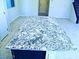 Island with granite countertop at 95 Palm Park Ct, Las Vegas, NV 89183