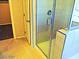Modern shower with glass door and chrome fixtures offers a sleek and clean aesthetic at 95 Palm Park Ct, Las Vegas, NV 89183