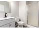 This bathroom features a black faucet and shower and frosted glass enclosure at 9604 Windom Point Ave, Las Vegas, NV 89129