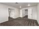Neutral bedroom with plush carpet flooring and several doors to the connecting rooms at 9604 Windom Point Ave, Las Vegas, NV 89129