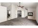 This living room boasts high ceilings and a modern fireplace at 9604 Windom Point Ave, Las Vegas, NV 89129