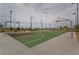 Residents enjoy a well-maintained basketball court with multiple hoops and ample space for friendly games at 961 Wembly Hills Pl, Henderson, NV 89011
