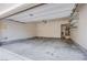 Spacious two car garage featuring a concrete floor and plenty of storage space at 961 Wembly Hills Pl, Henderson, NV 89011
