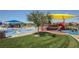 Vibrant community playground with colorful play structures, slides, and ample space for children to enjoy at 961 Wembly Hills Pl, Henderson, NV 89011