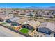 Aerial view of a neighborhood with artificial turf, patio and outdoor seating area at 10281 Sequoia Falls Pl, Las Vegas, NV 89149