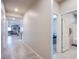 Long hallway connects the living spaces, bedrooms, and bathrooms, allowing for easy navigation at 10281 Sequoia Falls Pl, Las Vegas, NV 89149